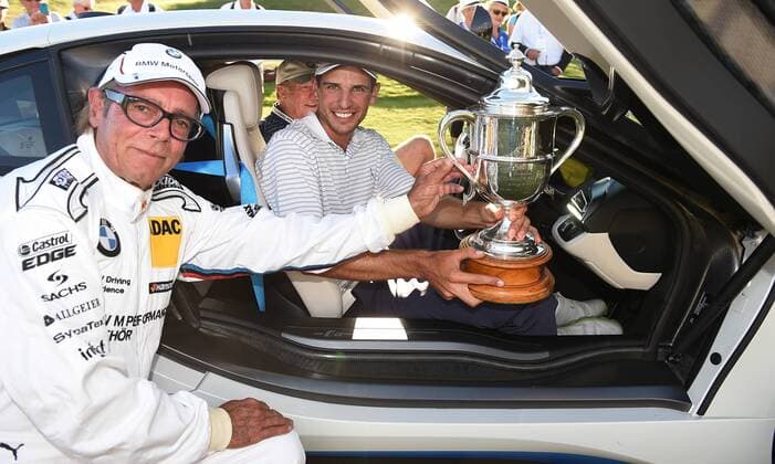 15.03.2015. Arrowtown, New Zealand. Sir Michael Hill and Australian golfer Jordan Zunic with the 2015 BMW New Zealand Golf Open Trophy. The Hills Golf course, Arrowtown, New Zealand. Sunday 15 March 2015. xAndrewxCornagax  ActionPlus11605239