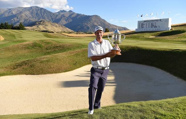 15.03.2015. Arrowtown, New Zealand. Australian golfer Jordan Zunic with the 2015 BMW New Zealand Golf Open Trophy. The Hills Golf course, Arrowtown, New Zealand. Sunday 15 March 2015. xAndrewxCornagax  ActionPlus11605240