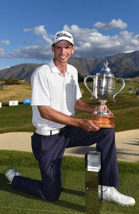 15.03.2015. Arrowtown, New Zealand. Australian golfer Jordan Zunic with the 2015 BMW New Zealand Golf Open Trophy. The Hills Golf course, Arrowtown, New Zealand. Sunday 15 March 2015. xAndrewxCornagax  ActionPlus11605241