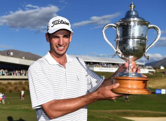 15.03.2015. Arrowtown, New Zealand. Australian golfer Jordan Zunic with the 2015 BMW New Zealand Golf Open Trophy. The Hills Golf course, Arrowtown, New Zealand. Sunday 15 March 2015. xAndrewxCornagax  ActionPlus11605242