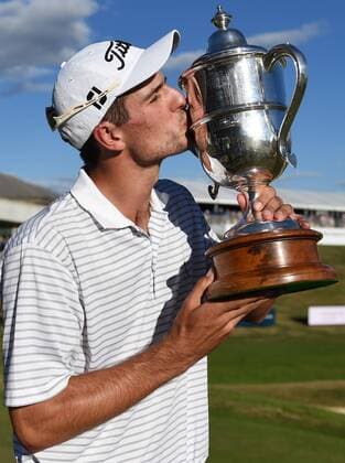 15.03.2015. Arrowtown, New Zealand. Australian golfer Jordan Zunic with the 2015 BMW New Zealand Golf Open Trophy. The Hills Golf course, Arrowtown, New Zealand. Sunday 15 March 2015. xAndrewxCornagax  ActionPlus11605243