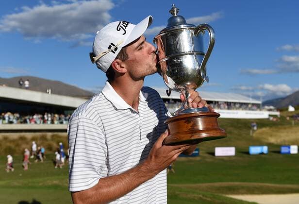 15.03.2015. Arrowtown, New Zealand. Australian golfer Jordan Zunic with the 2015 BMW New Zealand Golf Open Trophy. The Hills Golf course, Arrowtown, New Zealand. Sunday 15 March 2015. xAndrewxCornagax  ActionPlus11605244