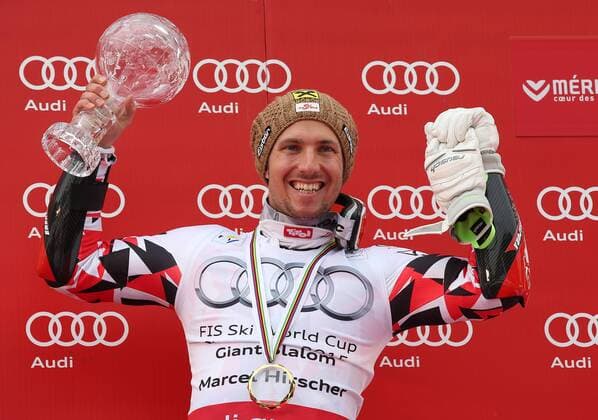 ALPINE SKIING - FIS WC Meribel MERIBEL,FRANCE,21.MAR.15 - ALPINE SKIING - FIS World Cup Final, giant slalom, men, award ceremony for the Giant Slalom World Cup. Image shows Marcel Hirscher (AUT). Keywords: crystal globe, trophy, medal.
