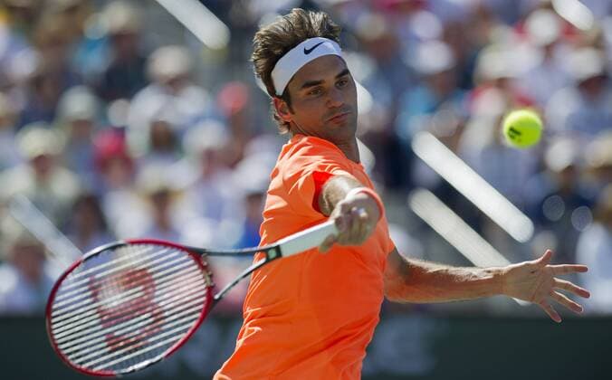 Roger Federer of Switzerland returns the ball during the men s semifinal match on the BNP Paribas Open tennis at the Indian Wells Tennis Garden in Indian Wells, California, the United States on March 21, 2015. (SP)US-INDIAN WELLS-TENNIS-BNP PARIBAS OPEN-FEDERER YangxLeiC 