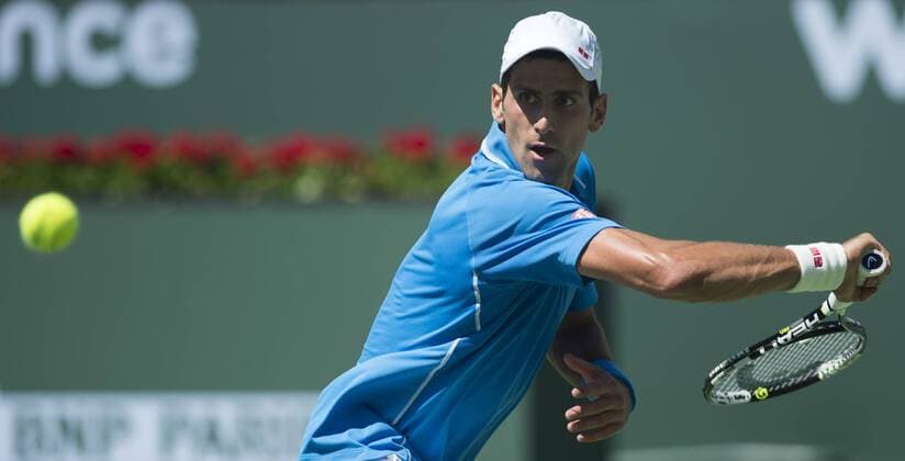 Novak Djokovic of Serbia returns the ball during the men s semifinal match on the BNP Paribas Open tennis at the Indian Wells Tennis Garden in Indian Wells, California, the United States on March 21, 2015. (SP)US-INDIAN WELLS-TENNIS-BNP PARIBAS OPEN-DJOKOVIC YangxLeic 