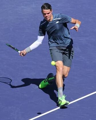 Milos Raonic of Canada hits a shot during his men s semifinal match at the BNP Paribas Open in Indian Wells, California on March 21, 2015.  IDW20150321721 DAVIDxSILPA
