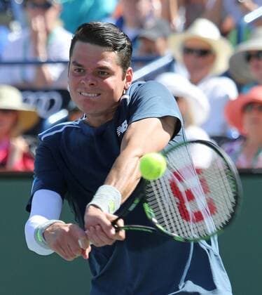 Milos Raonic of Canada hits a shot during his men s semifinal match at the BNP Paribas Open in Indian Wells, California on March 21, 2015.  IDW20150321743 DAVIDxSILPA