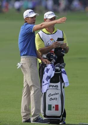 21 March 2015: Carlos Ortiz and his caddie during the third round of the Arnold Palmer Invitational at Arnold Palmer s Bay Hill Club & Lodge in Orlando, Florida. GOLF: MAR 21 PGA Golf Herren - Arnold Palmer Invitational -Third Round Icon31503212996 EDITORIAL USE ONLY