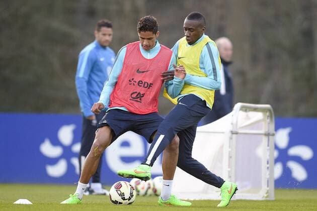 Blaise Matuidi et Raphael Varane FOOTBALL : Entrainement de l equipe de France - Clairefontaine - 23 03 2015 JBAutissier Panoramic 