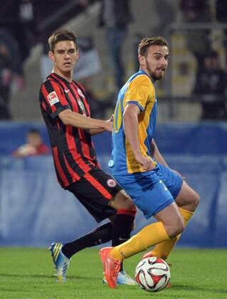 24.03.2015, xjhx, Fussball 1.Bundesliga, Eintracht Frankfurt - Kosovo, v.l. Johannes Flum (Eintracht Frankfurt), Faton Toski (Kosovo)