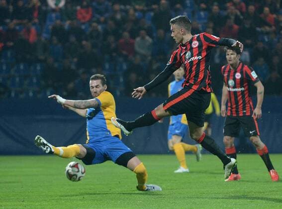 24.03.2015, xjhx, Fussball 1.Bundesliga, Eintracht Frankfurt - Kosovo, v.l. Avni Pepa (Kosovo), Luca Waldschmidt (Eintracht Frankfurt)