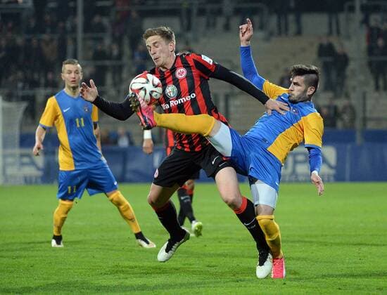 24.03.2015, xjhx, Fussball 1.Bundesliga, Eintracht Frankfurt - Kosovo, v.l. Bastian Oczipka (Eintracht Frankfurt), Fanol Perdedaj (Kosovo)