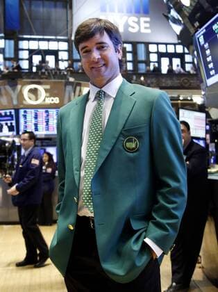 Defending Masters Champion Bubba Watson stands on the floor of the NYSE wearing his Green Jacket before the closing bell at the New York Stock Exchange on Wall Street in New York City on March 24, 2015. His appearance at the NYSE is to celebrate Bubba s defense of his 2014 Masters title just two weeks later and Kelly s defense of her Drive, Chip and Putt title at Augusta National the Sunday before the Masters Tournament.  NYP20150324108 JOHNxANGELILLO