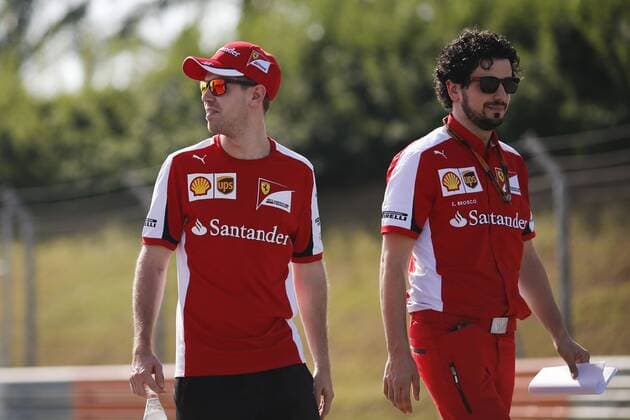 March 26, 2015 - Sepang, Malaysia - SEBASTIAN VETTEL of Germany and Scuderia Ferrari is seen walking the track with Scuderia Ferrari personnel during preparations to the 2015 Formula 1 Malaysia Grand Prix at Sepang International Circuit in Sepang, Malaysia. F1 2015 - Malaysia Grand Prix - Preparations - ZUMAg147