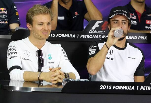 Nico Rosberg; Mercedes Grand Prix, Fernando Alonso, McLaren Honda, formula 1 GP, Malaysia in Kuala Lumpur Sepang 26.03.2015 Photo:mspb Thomas Melzer Nico Rosberg; Fernando Alonso, formula 1 GP, Malaysia