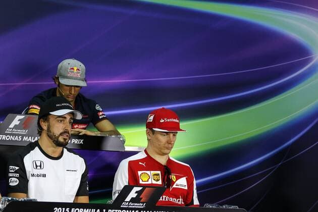 March 26, 2015 - Kuala Lumpur, Malaysia - Spanish F1 driver Fernando Alonso (Front-L) of Mc Laren, Finnish Kimi Räikkönen (front-R) of Scuderia Ferrari and Spanish Carlos Sainz Jnr of Scuderia Torro Rosso during a press conference PK Pressekonferenz ahead of Malaysian Formula One Grand Prix at Sepang International Circuit (SIC) in Malaysia on 26 March 2015. Alonso has passed all mandatory fitness tests and has been declared fit to race in this weekend Malaysia Grand Prix. Malaysian Formula One  - ZUMAn230