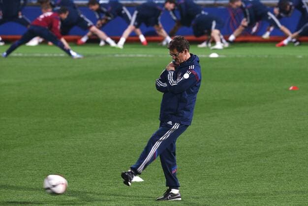 PODGORICA, MONTENEGRO. MARCH 26, 2015. Russia s head coach Fabio Capello kicks the ball during a training session of the Russian national football team ahead of a UEFA EURO EM Europameisterschaft Fussball 2016 qualifying match against Montenegro. Stanislav Krasilnikov TASS  RE15F8D1