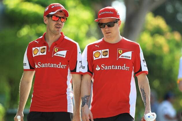 27 March 2015: Sebastian Vettel of Scuderia Ferrari with Kimi Raikkonen of Scuderia Ferrari at the paddock of the Formula 1 Petronas Malaysia Grand Prix held at Sepang International Circuit in Sepang, Malaysia. AUTO: MAR 27 Formula 1 - Malaysia Grand Prix Icon3781503278042 EDITORIAL USE ONLY