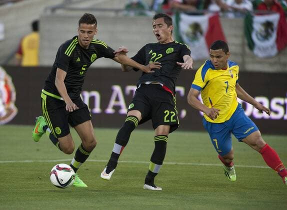 March 28, 2015 - Los Angeles, California, USA - 28 Mar 2015. Mexico defeated Ecuador, 1-0, in a friendly game held at the Los Angeles Coliseum. Pictured Diego Reyes and Paul Aguilar (Mexico) defended by Jefferson Montero Mexico defeated Ecuador, 1-0 - ZUMAp124