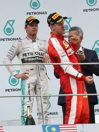 Sebastian Vettel, Scuderia Ferrar Sieger, Nico Rosberg; Mercedes Grand Prix, formula 1 GP, Malaysia in Kuala Lumpur Sepang 29.03.2015 Photo:mspb Thomas Melzer Sebastian Vettel, Nico Rosberg; formula 1 GP, Malaysia
