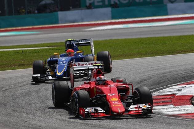 29.03.2015- Race, Kimi Raikkonen (FIN) Scuderia Ferrari SF15-T leads Felipe Nasr (BRA) Sauber C34 Malaysian Grand Prix, Sepang 26 - 29 March 2015 