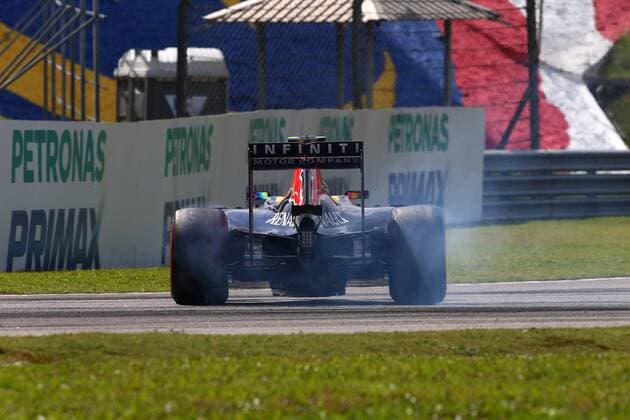 29.03.2015- Race, Daniil Kvyat (RUS) Red Bull Racing RB11 spins Malaysian Grand Prix, Sepang 26 - 29 March 2015 