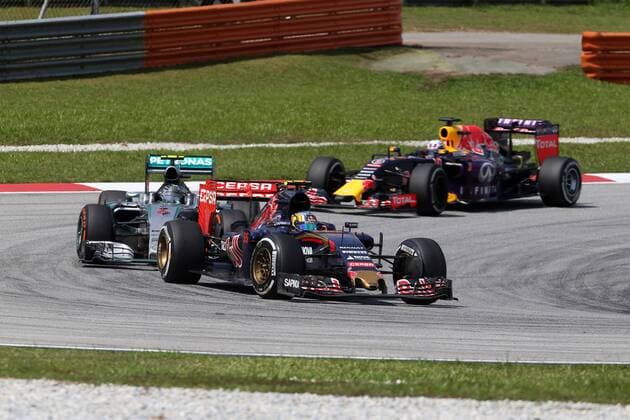 29.03.2015- Race, Carlos Sainz Jr (ESP) Scuderia Toro Rosso STR10 and Nico Rosberg (GER) Mercedes AMG F1 W06 Malaysian Grand Prix, Sepang 26 - 29 March 2015 
