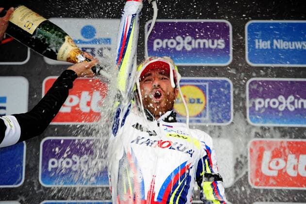 Luca PAOLINI ( ITA Katusha Team ) gewinnt endlich einen grossen Radsportklassiker - hier mit Sektdusche seiner Konkurrenten auf dem Podium - Jubel - Freude - Emotionen - Mimik - Gestik - Begeisterung - Siegerehrung - Zeremonie - Ceremony - Podium - Querformat - quer - horizontal - Event Veranstaltung: 77. Gent - Wevelgem 2015 - Deinze nach Wevelgem 239.1 km - Location Ort: Wevelgem - Belgium - Belgien - Europe - Europa - Date Datum: 25.03.2015