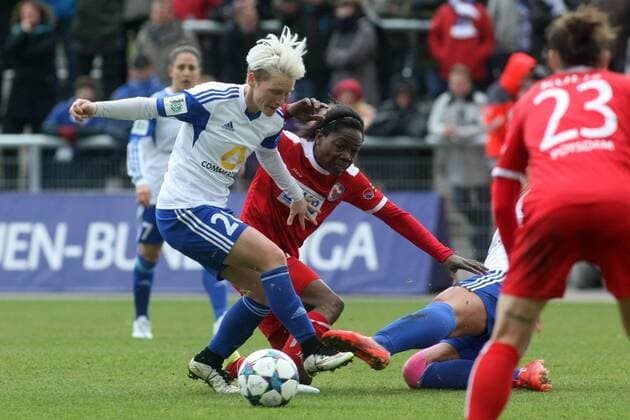DFB-Pokal der Frauen, Halbfinale: 1. FFC Frankfurt - 1. FFC Turbine Potsdam am Mittwoch (01.04.2015) im Stadion am Brentanobad in Frankfurt am Main. Jessica Fishlock (1. FFC Frankfurt, L), Genoveva Anonma (1. FFC Turbine Potsdam).