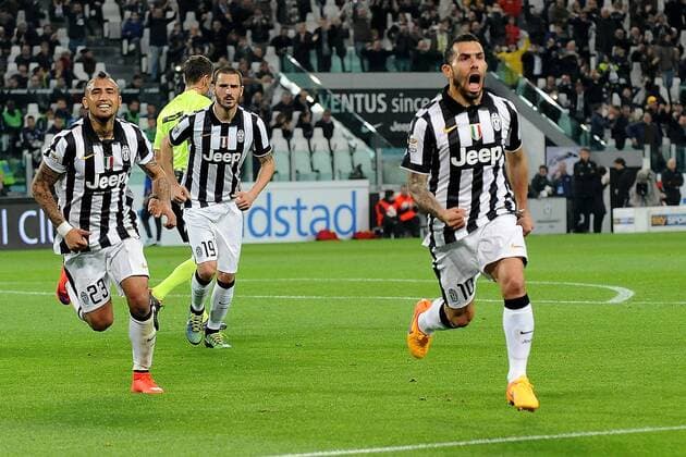 IPP20150404 Football - soccer: Serie A, Juventus Turin vs FC Empoli, CARLOS TEVEZ Torjubel mit ARTURO VIDAL und LEONARDO BONUCCI xHOCHxZWEIx xItalyxPhotoxPressx 