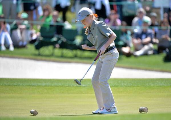 Vanessa Borovilos reacts after making a putt during the 7-9 girls division of the Drive, Chip and Putt National Finals during Masters week at Augusta, National in Augusta, Georgia on April 5, 2015.  WAP20150405313 KEVINxDIETSCH