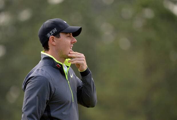 Rory McIlroy lines up a putt on the first green during a practice round prior to the 2015 Masters Tournament at Augusta, National in Augusta, Georgia on April 6, 2015.  AUG20150406310 KEVINxDIETSCH