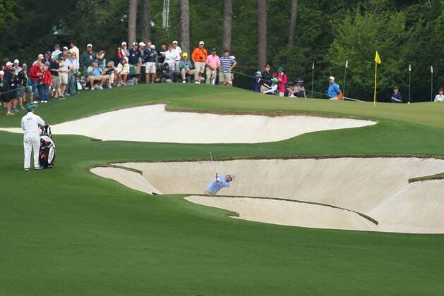 April 6, 2015 - Augusta, GA, USA - Adam Scott hits his second shot from deep in the fairway bunker to the first green to begin his practice round on Monday, April 6, 2015, at Augusta National Golf Club in Augusta, Ga. Masters practice round - ZUMAm67_