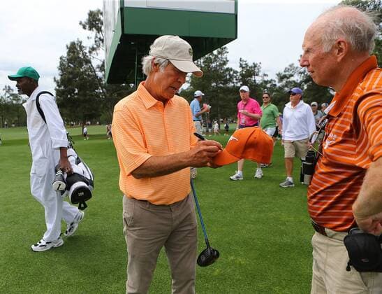 April 6, 2015 - Augusta, GA, USA - Ben Crenshaw, playing in his final Masters, stops to autograph the hat of fan Larry Rutledge of Austin, Texas, during his practice round on Monday, April 6, 2015, at Augusta National Golf Club in Augusta, Ga. Masters practice round - ZUMAm67_