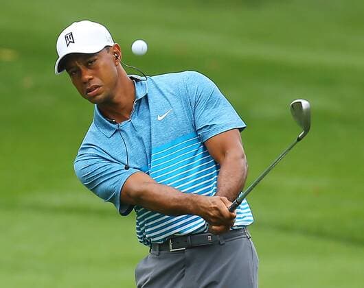 April 6, 2015 - Augusta, GA, USA - Tiger Woods chips to the practice green during his practice round for the Masters on Monday, April 6, 2015, at Augusta National Golf Club in Augusta, Ga. Masters practice round - ZUMAm67_