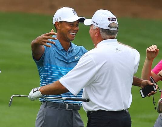 April 6, 2015 - Augusta, Georgia, U.S. - TIGER WOODS, left, and MARK O MEARA greet each other with a hug at the Augusta National Golf Club practice range during practice for the Masters golf tournament. Golf 2015 - The Masters - Practice Round - ZUMAm67_