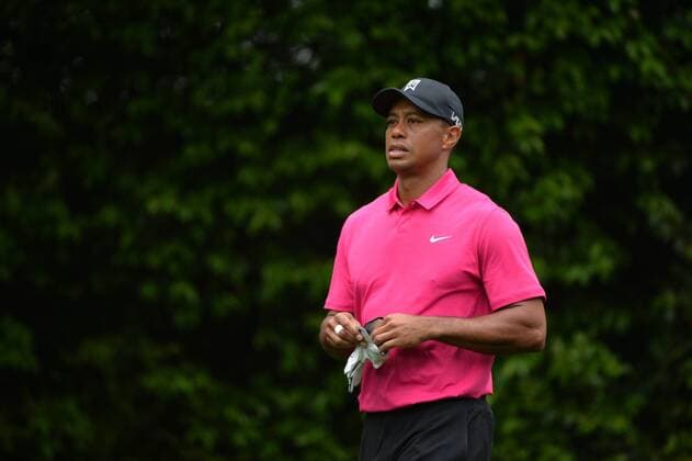 Tiger Woods watches his drive off of the 5th tee during a practice round prior to the 2015 Masters Tournament at Augusta, National in Augusta, Georgia on April 7, 2015.  AUG20150407306 KEVINxDIETSCH