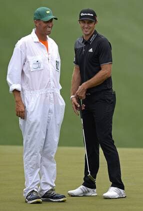 April 7, 2015 - Augusta, GA, USA - Caddie Jim Bones Mackay, left, and golfer Dustin Johnson, right, joke on the 10th green during practice on Tuesday, April 7, 2015 at Augusta National Golf Club in Augusta, Ga. Mackay caddies for golfer Phil Mickelson. Masters practice - ZUMAm67_