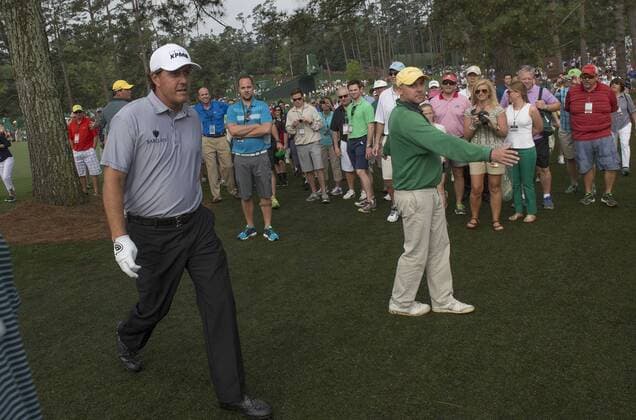Phil Mickelson walks to the 7th fairway to find his ball after hitting a wild shot off of the 17th tee during a practice round at the 2015 Masters Tournament at Augusta, National in Augusta, Georgia on April 8, 2015.  AUG20150408330 KEVINxDIETSCH