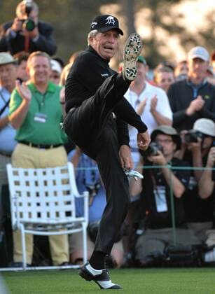 Gary Player does a kick after he tees off at hole 1 to start the 2015 Masters Tournament at Augusta National Golf Club in Augusta, Georgia on April 9, 2015.  MAS20150409103 KEVINxDIETSCH