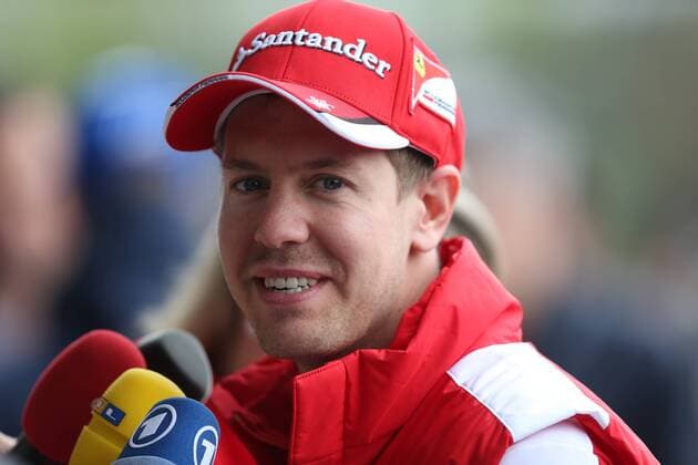 German F1 driver Sebastian Vettel of Ferrari is interviewed at the Shanghai International Circuit before the 2015 Formula 1 Chinese Grand Prix in Shanghai, China, 9 April 2015. F1 drivers wow fans with signatures and selfies in Shanghai  20150409_30138