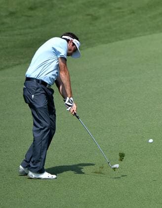 Bubba Watson hits his approach shot to the 9th green in the first round of the 2015 Masters Tournament at Augusta National Golf Club in Augusta, Georgia on April 9, 2015.  MAS20150409142 KEVINxDIETSCH