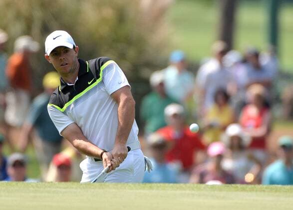 Rory McIlroy chips on to the third green in the first round of the 2015 Masters Tournament at Augusta National Golf Club in Augusta, Georgia on April 9, 2015.  MAS20150409151 KEVINxDIETSCH