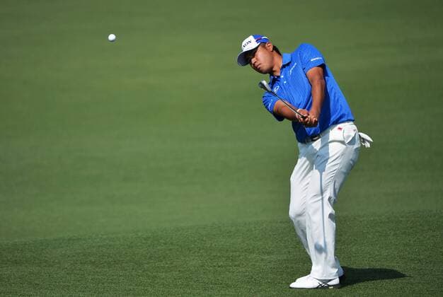 Hideki Matsuyama hits a pitch shot to the second green in the first round the 2015 Masters Tournament at Augusta National Golf Club in Augusta, Georgia on April 9, 2015.  MAS20150409170 KEVINxDIETSCH