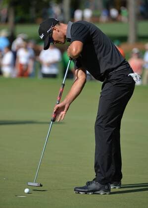 Adam Scott putts on the second green using his belly putter in the first round the 2015 Masters Tournament at Augusta National Golf Club in Augusta, Georgia on April 9, 2015.  MAS20150409159 KEVINxDIETSCH
