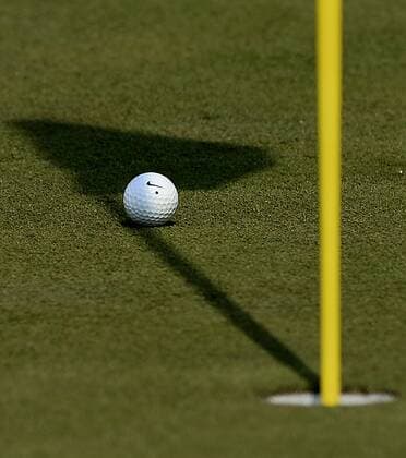 April 9, 2015 - Augusta, GA, USA - Rory McIlroy s ball sits in the shadow of the pin on the second green during first round action of the Masters Tournament at Augusta National Golf Club on Thursday, April 9, 2015 in Augusta, Ga. Golf Masters - ZUMAm67_