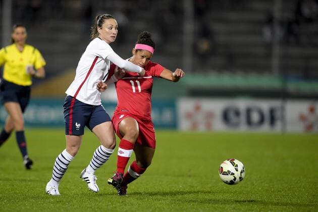 Gaetane Thiney (France) vs Desiree Scott (Canada) FOOTBALL : France vs Canada - Amical - 09 04 2015 JBAutissier Panoramic 
