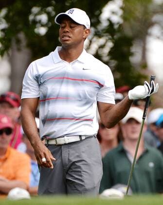 Tiger Woods reacts after his tee shot on the 4th hole in the first round the 2015 Masters Tournament at Augusta National Golf Club in Augusta, Georgia on April 9, 2015.  MAS20150409176 KEVINxDIETSCH