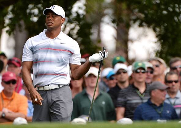 Tiger Woods reacts after his tee shot on the 4th hole in the first round the 2015 Masters Tournament at Augusta National Golf Club in Augusta, Georgia on April 9, 2015.  MAS20150409175 KEVINxDIETSCH