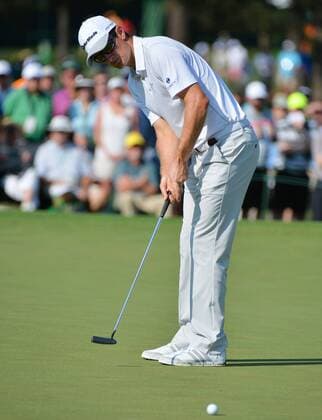 Justin Rose putts on the second green in the first round of the 2015 Masters Tournament at Augusta National Golf Club in Augusta, Georgia on April 9, 2015.  MAS20150409190 KEVINxDIETSCH